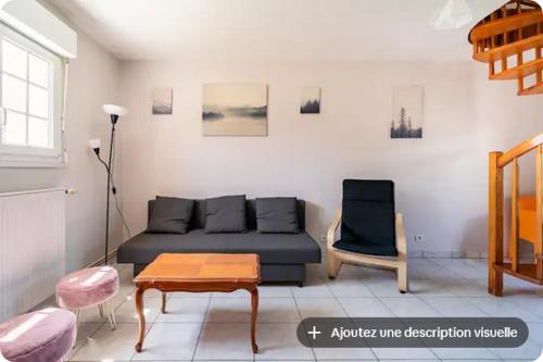 Ruang duduk di Gîte de groupe du Coudray