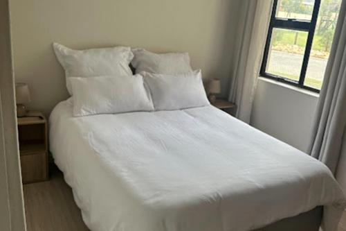 Katil atau katil-katil dalam bilik di Stone Ridge Haven - Suite 1