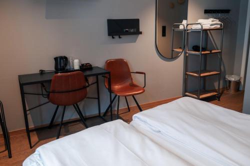 Katil atau katil-katil dalam bilik di Trolltunga Hotel