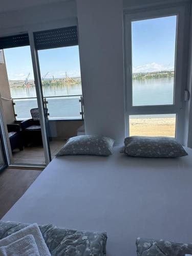 Postel nebo postele na pokoji v ubytování Apartmani Casper