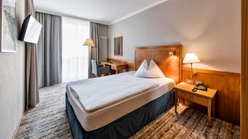 HOTEL POST alpine cityflairにあるベッド