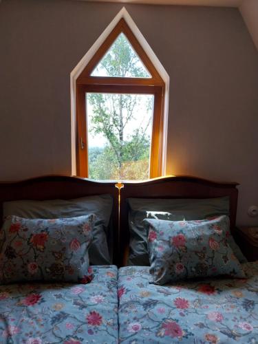 Postel nebo postele na pokoji v ubytování Apartmán Júlia