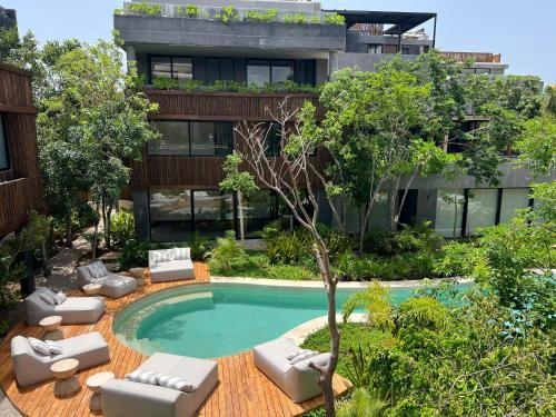 Bazén v ubytování Tulum 2BR Jacuzzi Privado Lujo & Piscinas Humana 800m Playa nebo v jeho okolí