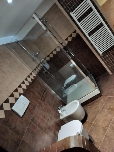 an overhead view of a bathroom with a toilet and a sink at DolceVita Eur2 Luxury Apartament in Rome