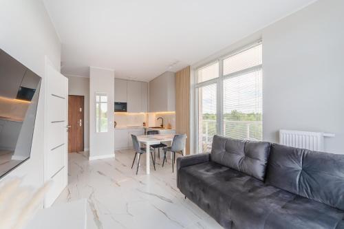 Η κουζίνα ή μικρή κουζίνα στο Apartament Messa White II z Basenem Letnim by HolidaySun