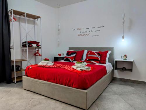 Postel nebo postele na pokoji v ubytování I colori della Sicilia