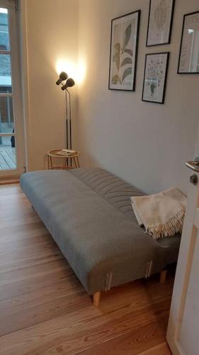 Postel nebo postele na pokoji v ubytování Lejlighed i centrum