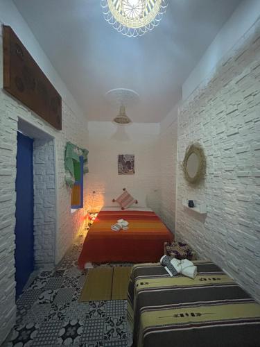 Cama o camas de una habitación en Riad Al Borj