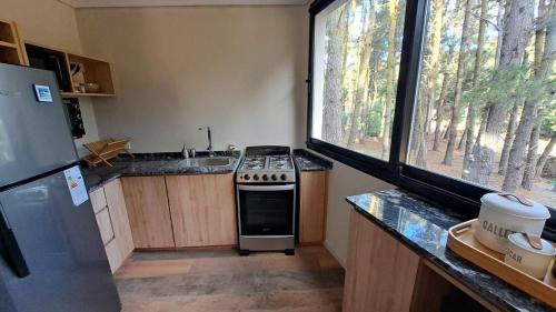 Kuchyň nebo kuchyňský kout v ubytování Casa MARITE II