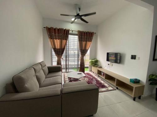 Гостиная зона в MyHomestay Adelia 2