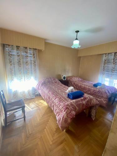 Postel nebo postele na pokoji v ubytování Julia Apparts - DEPARTAMENTO EN EL CENTRO DE LA CIUDAD