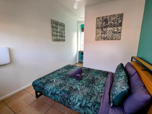 Кровать или кровати в номере Ozzie Pozzie Backpackers