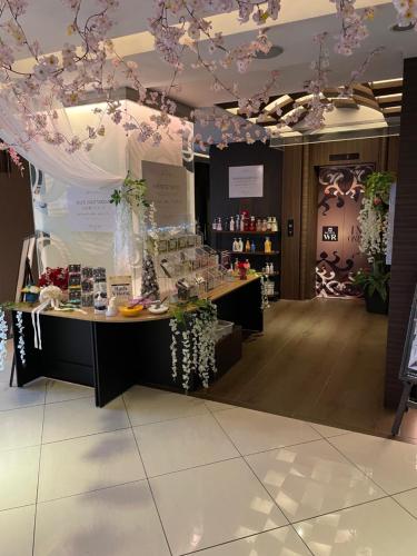 a store with a table with products on it at Hotel Water Resort Sendai (Adult Only) in Sendai