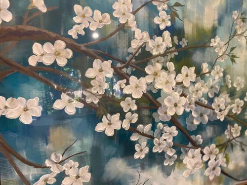 a painting of white flowers on a branch at University lifestyle in Melbourne