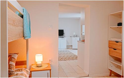 Postel nebo postele na pokoji v ubytování Family studio apartman