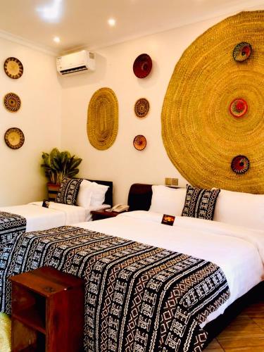 Postel nebo postele na pokoji v ubytování Kerama Silent Lodge