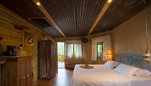 Postel nebo postele na pokoji v ubytování ORIGIN Eco Chalet