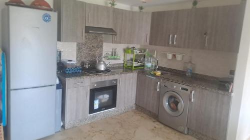 Η κουζίνα ή μικρή κουζίνα στο Bel appart à Hacienda Beach Sidi Rahal
