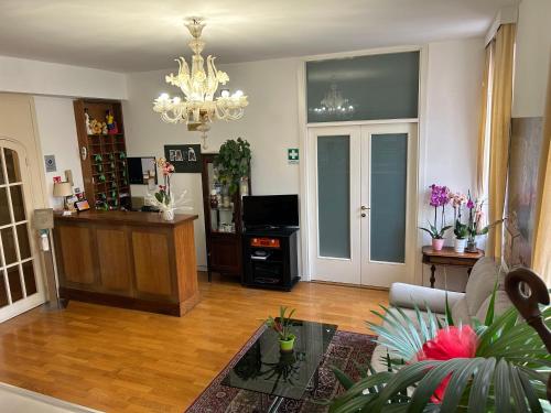 Kuchyň nebo kuchyňský kout v ubytování HOTEL LA LOGGIA
