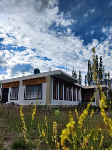 a house in the middle of a field at Nubra Holiday in Deskit