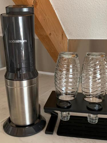 Příslušenství pro přípravu čaje a kávy v ubytování Ferienwohnung Leonardo