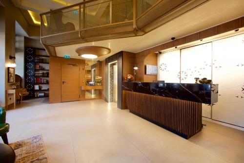 a lobby with a bar in a building at Hotel Momento Golden Horn in Istanbul