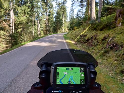 a person riding a motorcycle on a road at Ferienwohnung Panoramablick in Bad Wildbad