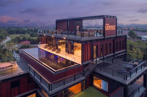 an overhead view of a building with a balcony at The Gems Mining Pool Villas Pattaya in Nong Prue