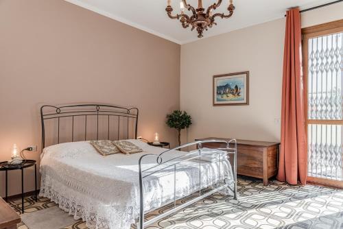Postel nebo postele na pokoji v ubytování Casa Olimpia