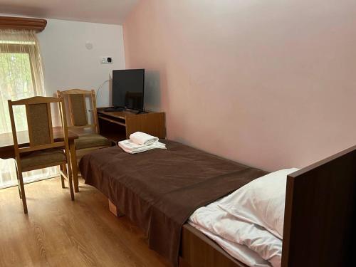 Postel nebo postele na pokoji v ubytování Nectar hotel