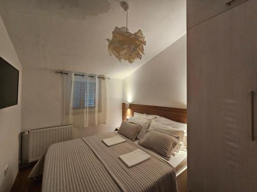 Ένα ή περισσότερα κρεβάτια σε δωμάτιο στο Cozy Designed & Sea view Apartment SULYE, Zaboric Sibenik