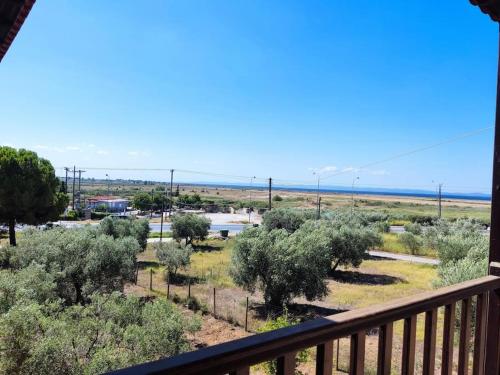 a view of the desert from a balcony at Psakoudia old olive trees appartment 50 m2, 2 bedrooms, sea view in Psakoudia