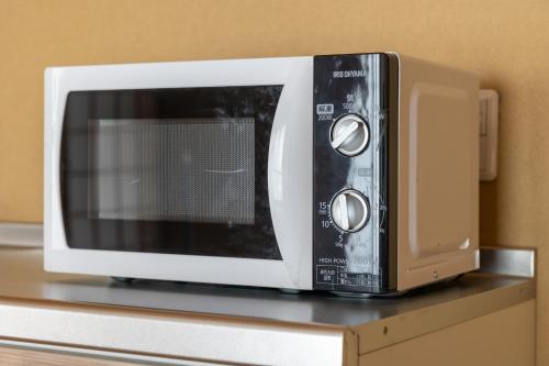 あざみ庵 302にあるキッチンまたは簡易キッチン