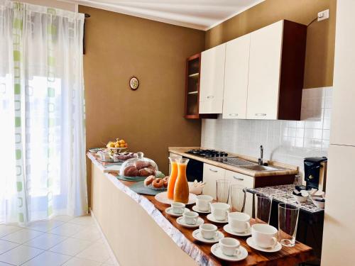 Kuchyň nebo kuchyňský kout v ubytování B&B Tempa Rossa