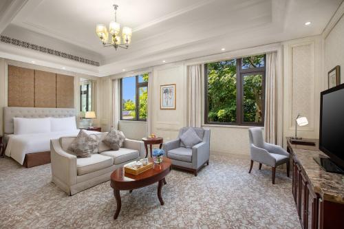 Carp Islet Resort Fuzhouにあるテレビまたはエンターテインメントセンター