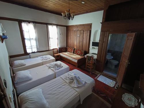Katil atau katil-katil dalam bilik di Arifbey Konak Hotel