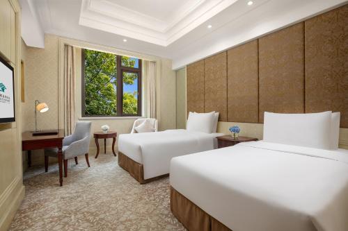 Carp Islet Resort Fuzhouにあるベッド