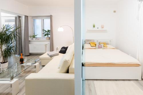 Postel nebo postele na pokoji v ubytování Apartmán v Srdci Náchoda