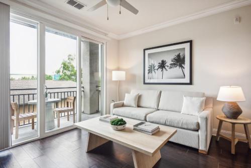 a living room with a couch and a table at Century Millenia in Orlando in Orlando