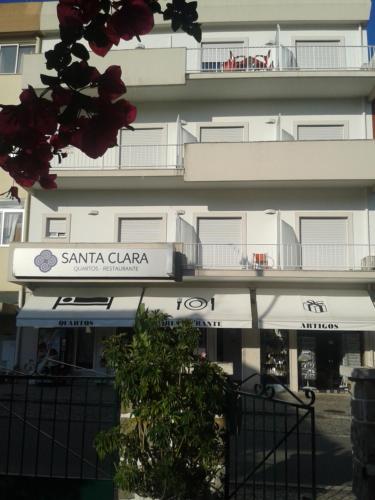 a building with a santa clara sign on it at Residencial Santa Clara in Fátima