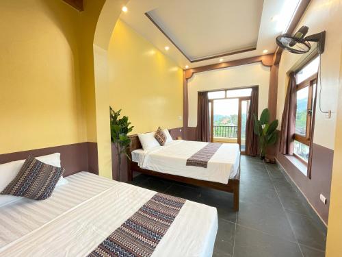 Postel nebo postele na pokoji v ubytování Wings Ha Giang Loop Bungalow