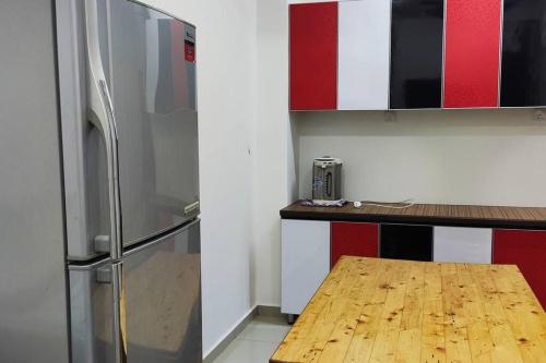 Η κουζίνα ή μικρή κουζίνα στο Amin Homestay Jln Langgar HSB