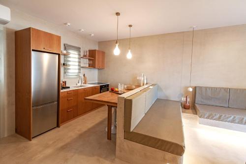Kuchyň nebo kuchyňský kout v ubytování Pefki Luxury Suites