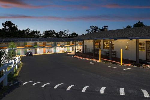 a parking lot in front of a building at Quality Inn & Suites in Jackson