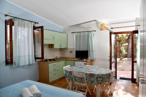 Кухня или мини-кухня в Agriturismo Ezzi Mannu
