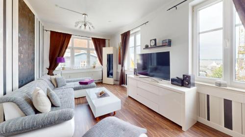 Televisyen dan/atau pusat hiburan di Apartments am Sund