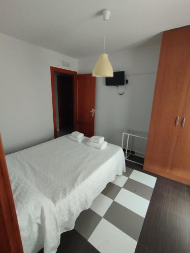 Katil atau katil-katil dalam bilik di Hostal Bordillas