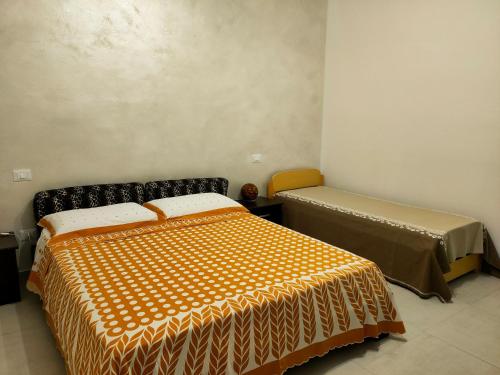 Postel nebo postele na pokoji v ubytování Casa l'Apuccia