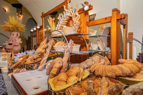 a display of breads and pastries in a bakery at Arabella Azur Resort in Hurghada