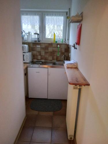 Kuchyň nebo kuchyňský kout v ubytování Ferienwohnung Hecking